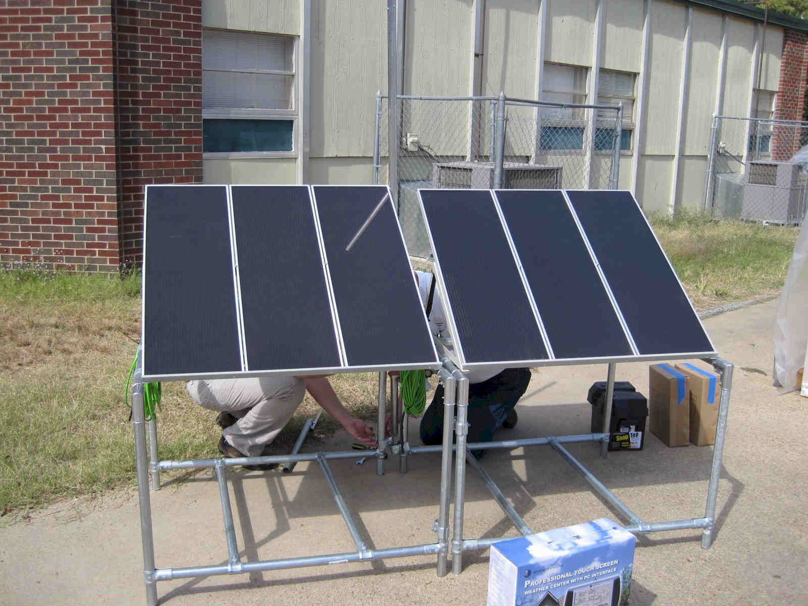 Delivering and setting up the solar panel array.
